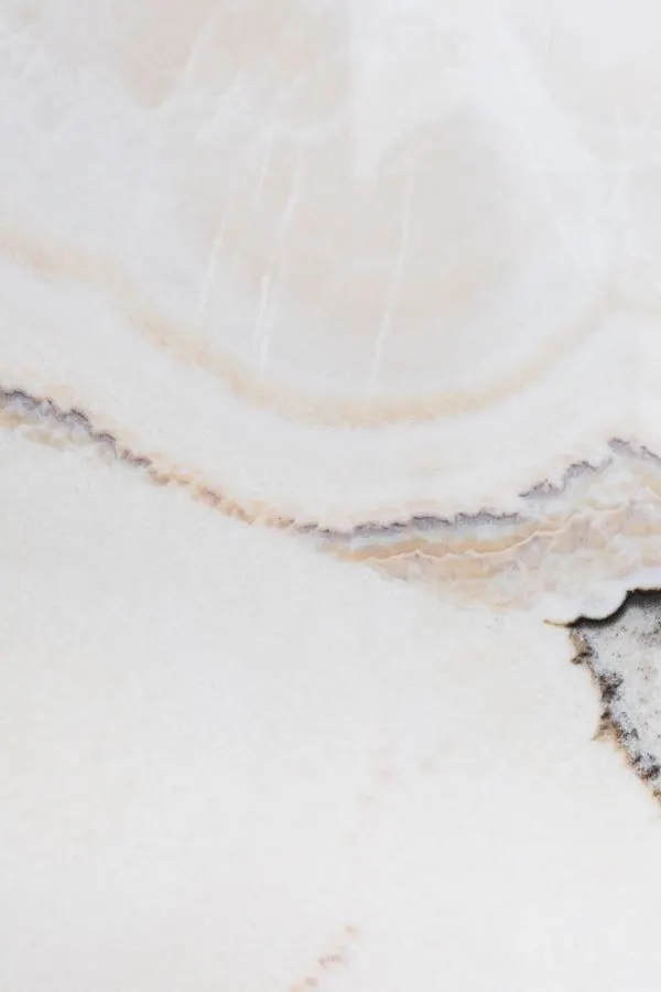White marble surface with beige and grey veining